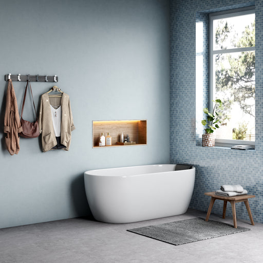Elegant fristående badkar Sandra i ett blått badrum